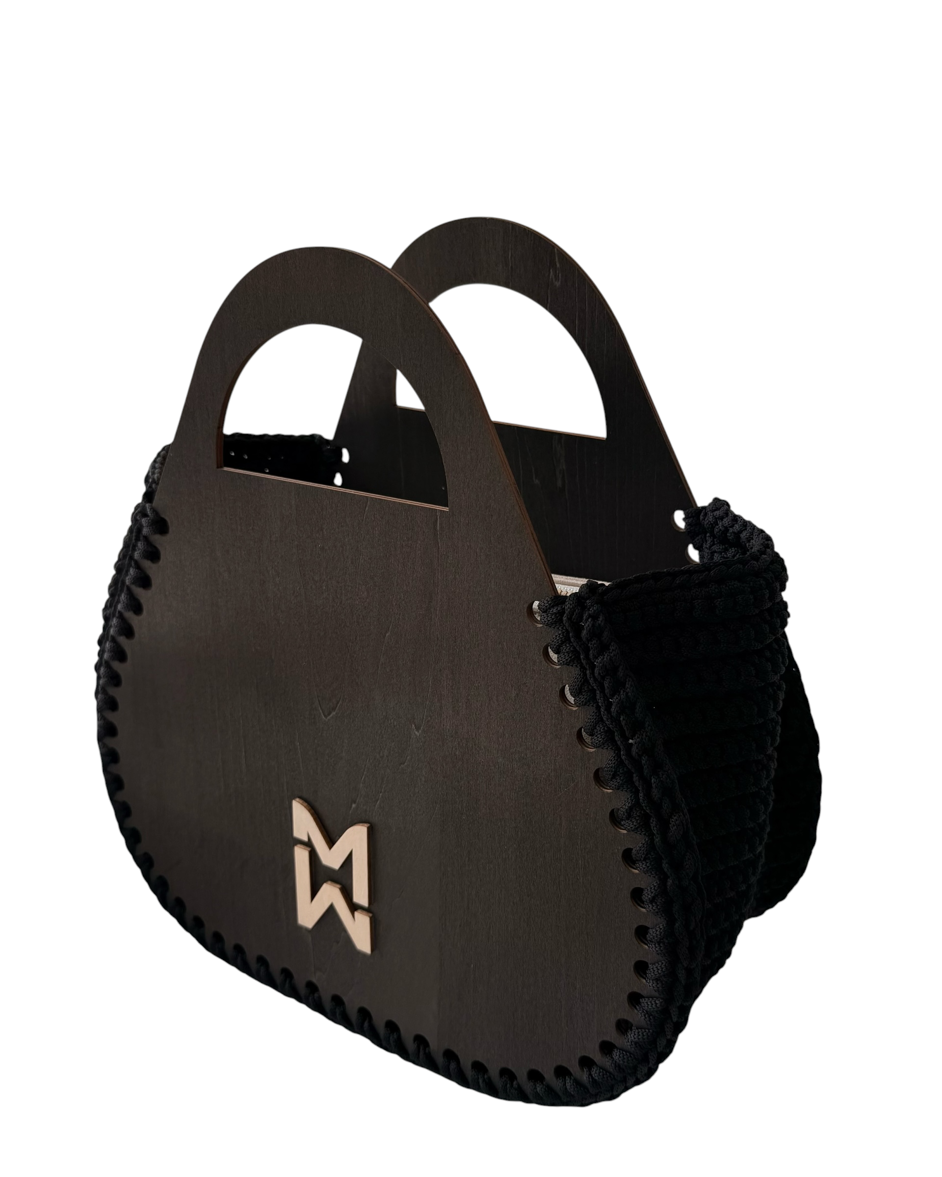 Makafui Noir collection featuring luxury handmade crochet handbags with structured wooden frames in black.
